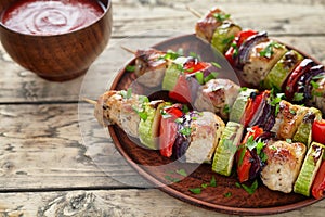 Barbecued marinated turkey or chicken meat shish kebab skewers