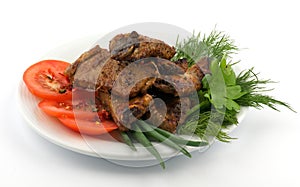 Barbecued pork ribs on white plate