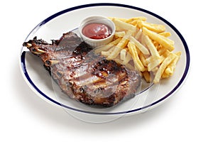 Barbecued pork spare ribs and french fries