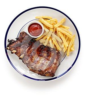 Barbecued pork spare ribs and french fries