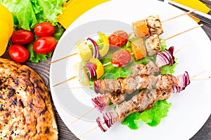 Barbecued pork and vegetable kebabs