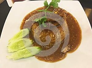 The barbecued red pork in sauce with rice