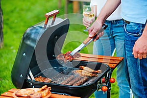 Barbecuing meat to perfection. photo