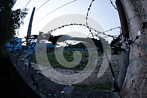 Barbed and razor wire on a fence