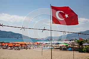 Barbed wire as a symbol of closed beach due to quarantine