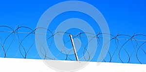 Barbed wire barrier