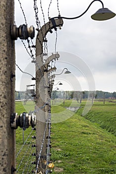 Barbed wire fence in Auschwitz II-Birkenau Concentration Camp in Poland.