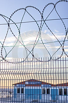 Barbed wire and fence at customs