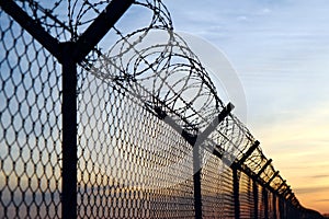 Barbed wire fence on the european border photo