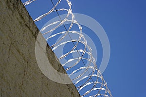 Barbed Wire Protects a Residence from Intruders photo