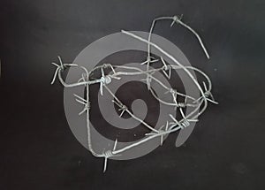 barbed wire isolated on black background