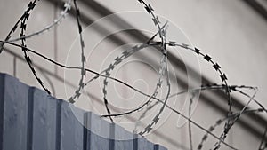 Barbed wire on prison wall