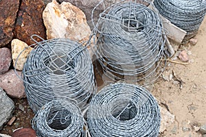 Barbed wire rolls