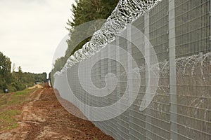 Barbed wire steel wall against the immigrations in Europe