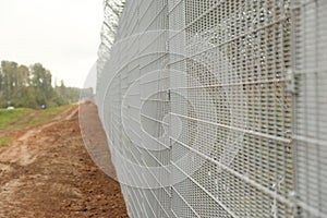 Barbed wire steel wall against the immigrations in Europe