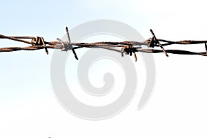 The barbed wire in two rows as protection against unauthorized entry into private territory