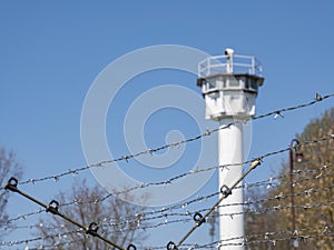 Barbed wire with watchtower former border