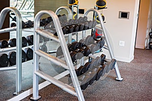 Barbell free weights on rack