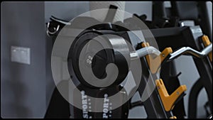 Barbell in the gym. Close up view. Sport, training. Sports simulator