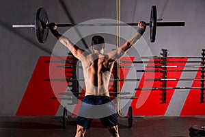 Barbell weight lifting man rear view workout gym