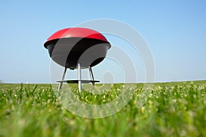 Barbeque grill on meadow