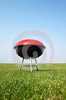 Barbeque grill on meadow
