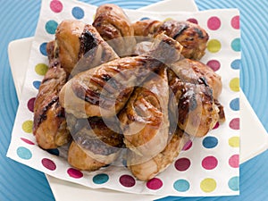 Barbeque and Honey Glazed Chicken Drumsticks photo