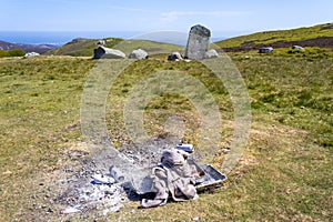 Barbeque litter at The Druid\'s Circle, above Penmaenmawr, Gwynedd, Wales, UK