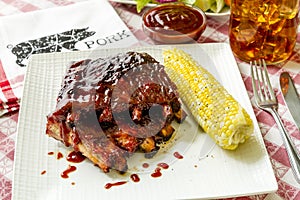 Barbeque racks of ribs with sauce