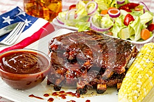 Barbeque racks of ribs with sauce