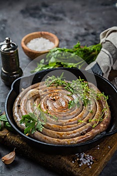 Barbeque sausages on cast iron pan