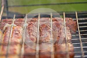 Barbeque sausages outdoors, selective focus