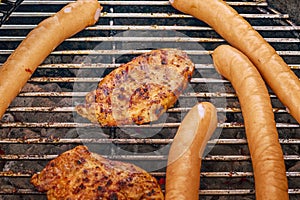 Barbeque sausages and pork chops