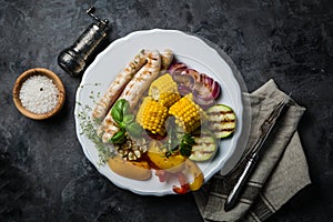 Barbeque sausages with vegetables