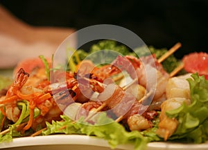 Barbequed prawn salad with shrimp lettuce and green lime