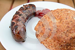 Barbequed Sausage with a roll