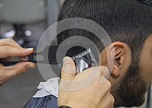 Barber cutting hair