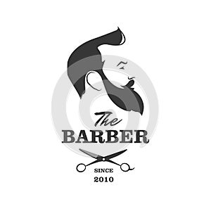 The Barber. Handsome man with beard and mustache. Scissors. Barber shop.