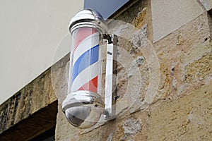 Barber pole shop sign vintage wall barbershop in street