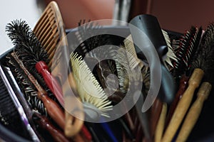 Barber`s combs tools in a salon