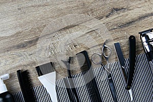 Barber`s hair cut kit, striped towel lined with scissors, hair, tidour, dangerous razor and hair brush