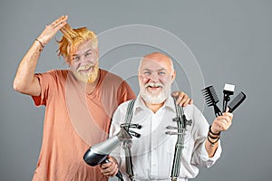 Barber with scissors and razor, barbershop. Work in the Barber shop. Hair equipment. Beard man, bearded male. Portrait