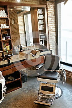 Barber Shop Interior. Men Beauty Hair Salon With Antique Chair