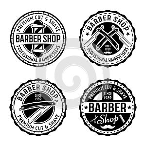 Barber shop set of four vector round badges, emblems, labels or logos in vintage style isolated on white background