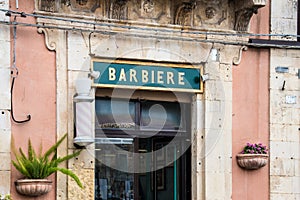 Barber shop sign in Palazzolo Acreide, Siracusa, Sicily, Italy