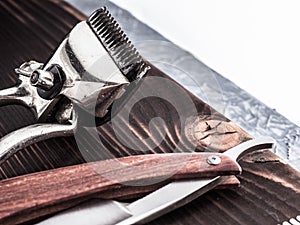 Barber tools. vintage clipper straight razor. hairbrush