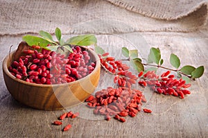 Barberry with leaves and dry goji berries