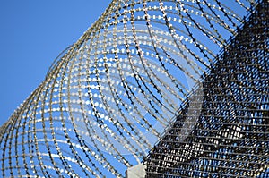 Barbwire on a prison wall