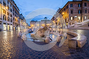 Barcaccia fountain in Piazza di Spagna by night, Rome