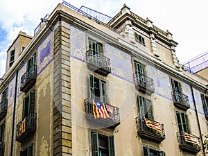 Barcelona architecture - old building with Catalonia flag - Spanish colonial architecture